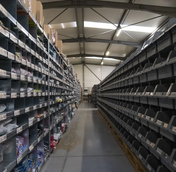 Picking zone with labelled bins in a BigArena warehouse